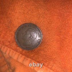 1938 UK Great Britain British One Penny George VI Coin. Brown